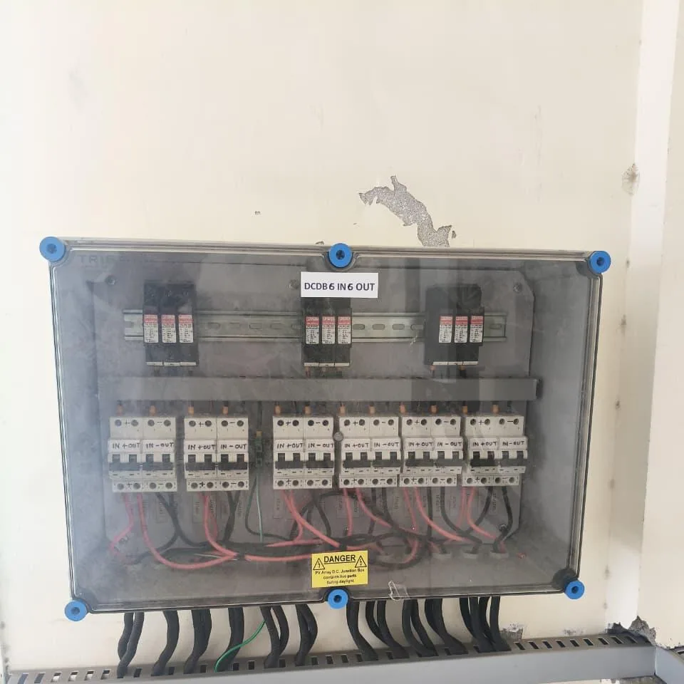 Transparent six-input solar DC distribution box with breakers, surge protection and dressed cable terminations