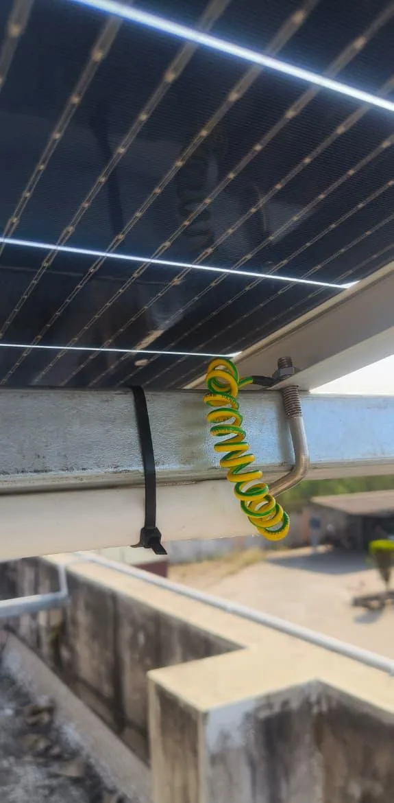 Green and yellow earthing conductor bonded to the solar mounting structure