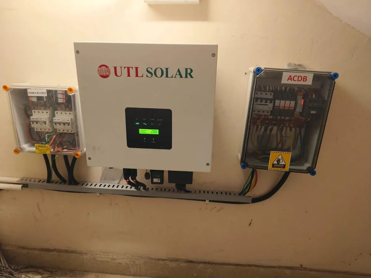 Installed solar inverter with labelled AC and DC protection boards