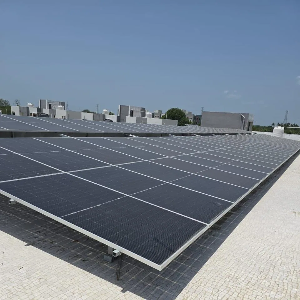 Large completed rooftop solar panel field in Mahuva with multiple aligned rows
